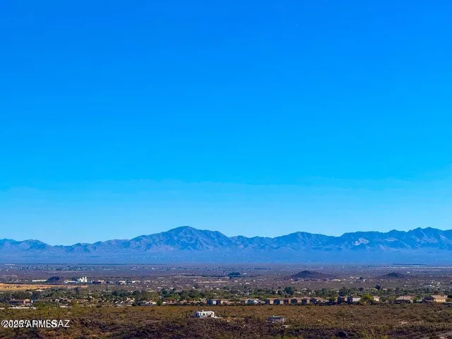 a view of a city with mountain