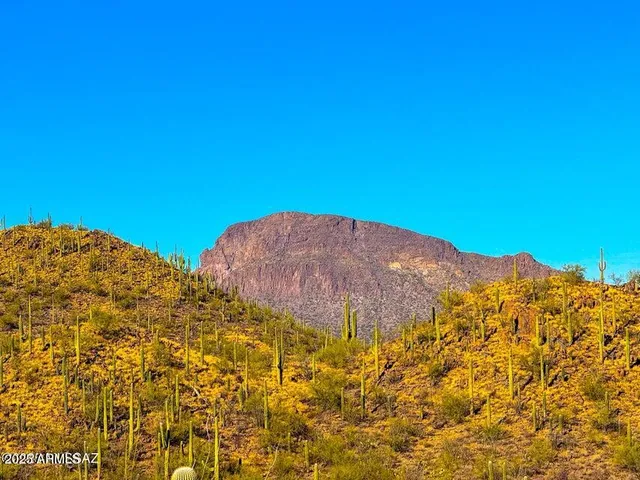 a view of a mountain with a view of mountains