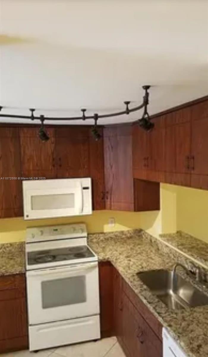 4345 Northwest 69th Terrace, Unit 4345 Lauderhill, FL 33319 - Photo 4 of 20 a view of a kitchen counter space