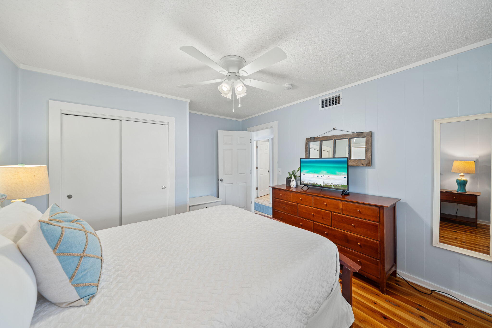 8009 East County Highway 30A Inlet Beach, FL 32461 - Photo 20 of 53 a bedroom with a bed and a dresser in it