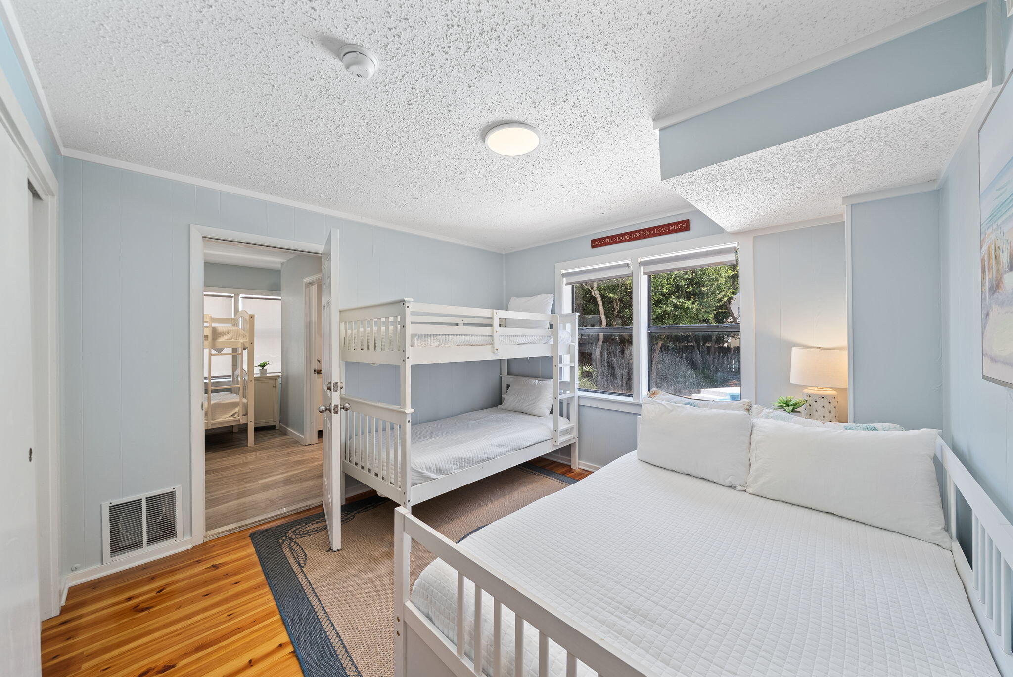 8009 East County Highway 30A Inlet Beach, FL 32461 - Photo 24 of 53 a bedroom with furniture and a window