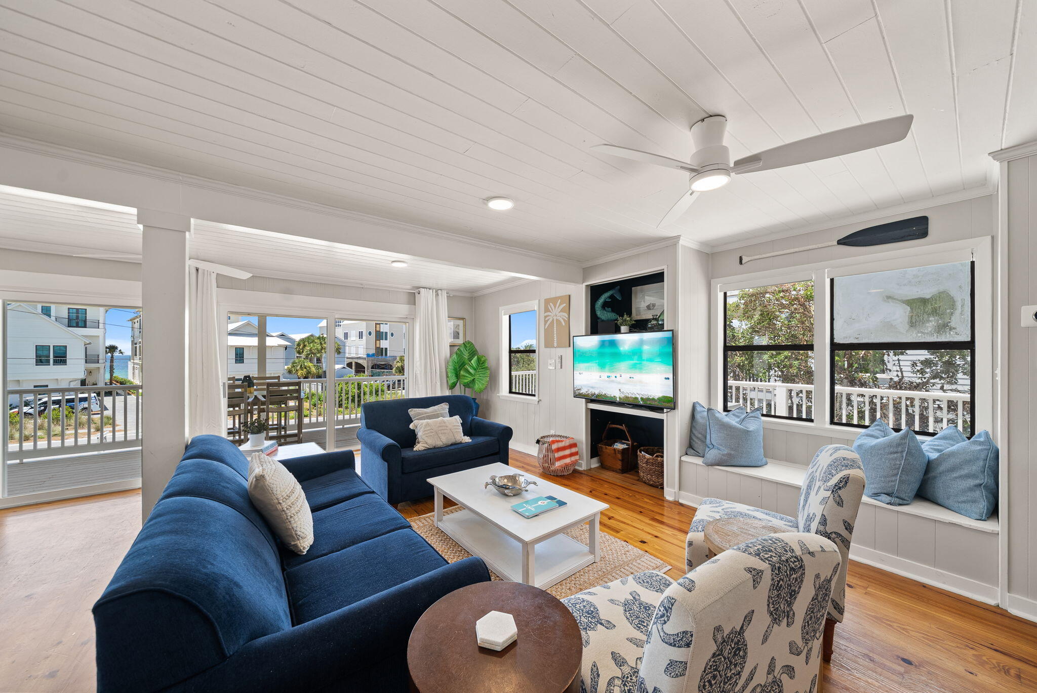8009 East County Highway 30A Inlet Beach, FL 32461 - Photo 3 of 53 a living room with fireplace furniture and a large window