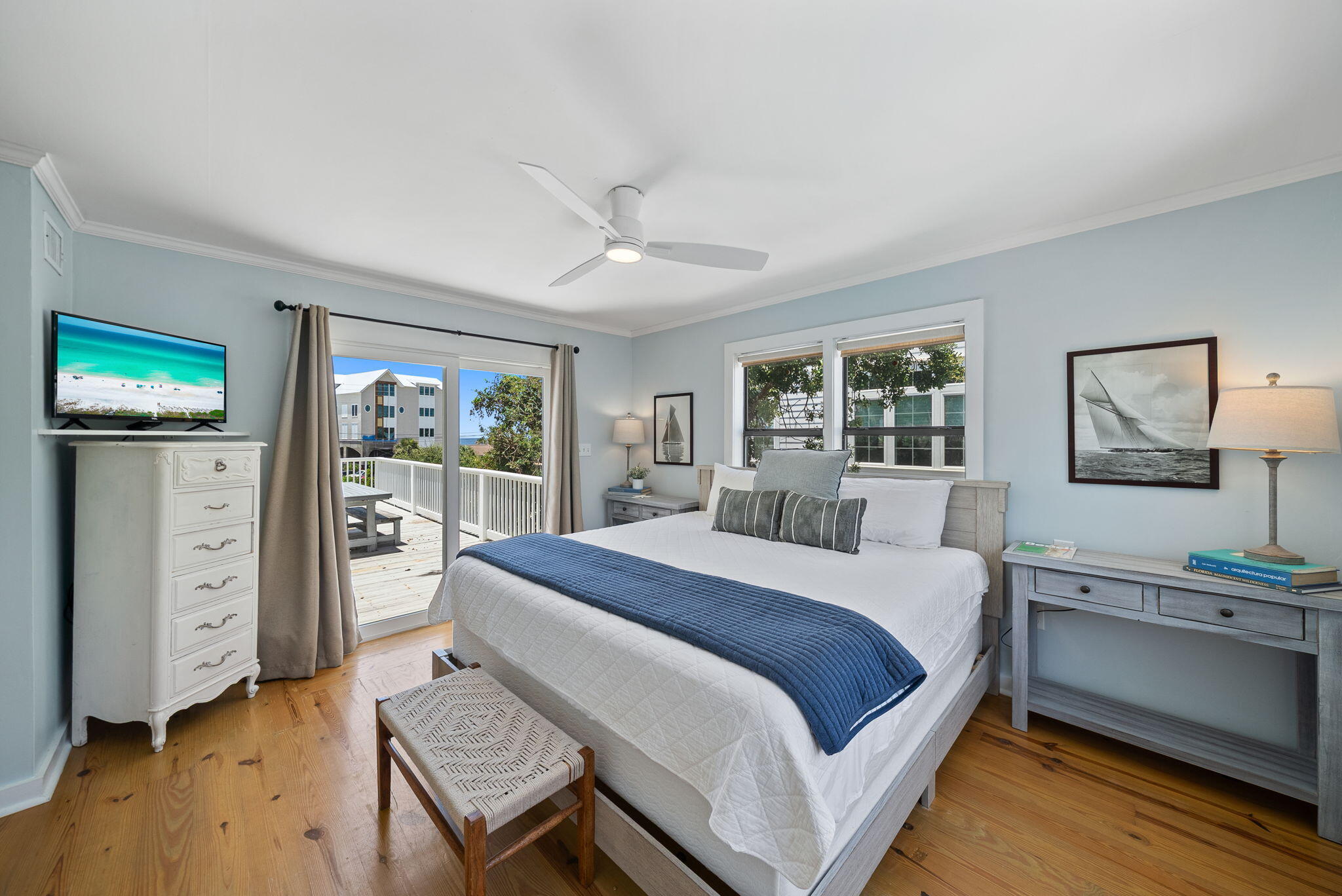 8009 East County Highway 30A Inlet Beach, FL 32461 - Photo 35 of 53 a bedroom with a large bed and a dresser