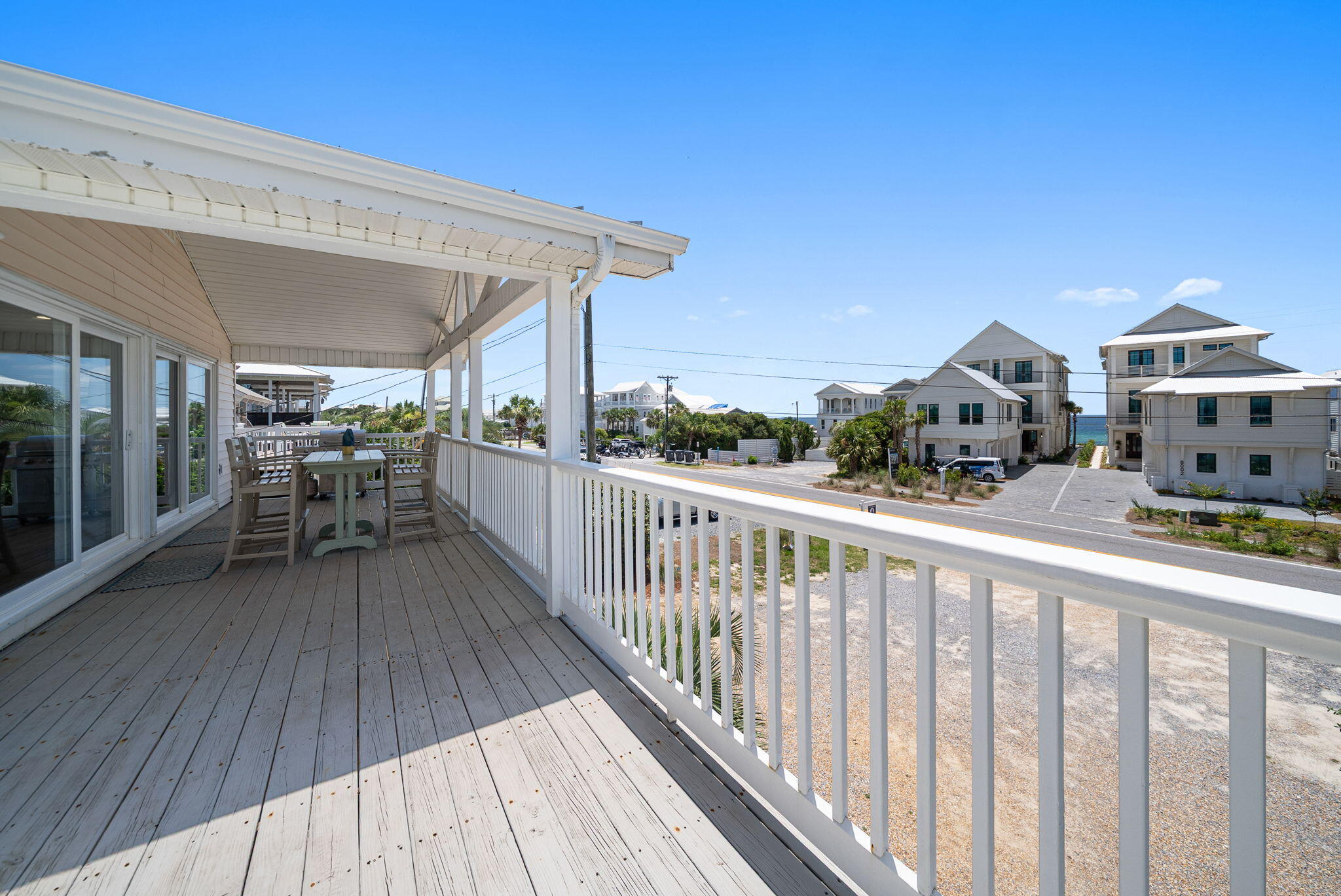8009 East County Highway 30A Inlet Beach, FL 32461 - Photo 43 of 56 a view of a balcony with chairs