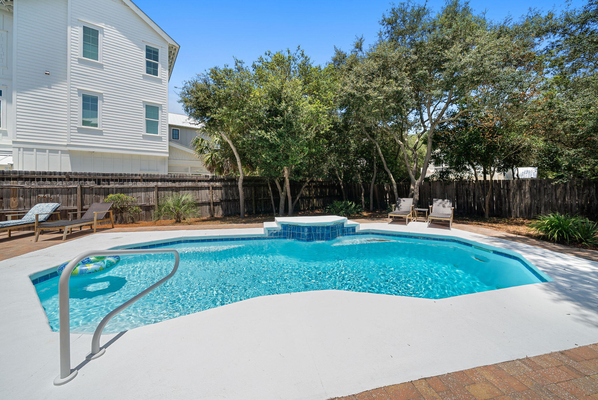 8009 East County Highway 30A Inlet Beach, FL 32461 - Photo 46 of 56 a view of a swimming pool with a backyard