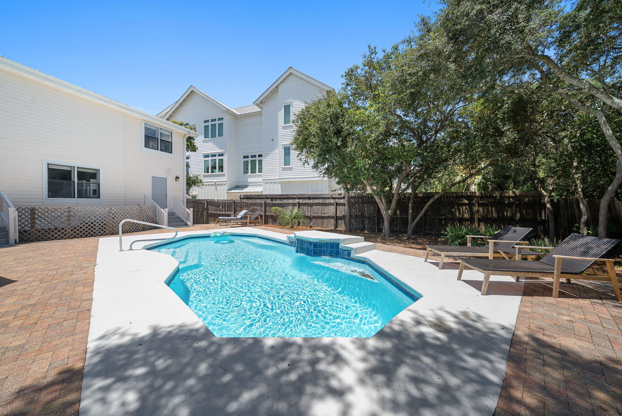 8009 East County Highway 30A Inlet Beach, FL 32461 - Photo 47 of 53 a view of a house with backyard patio and sitting area