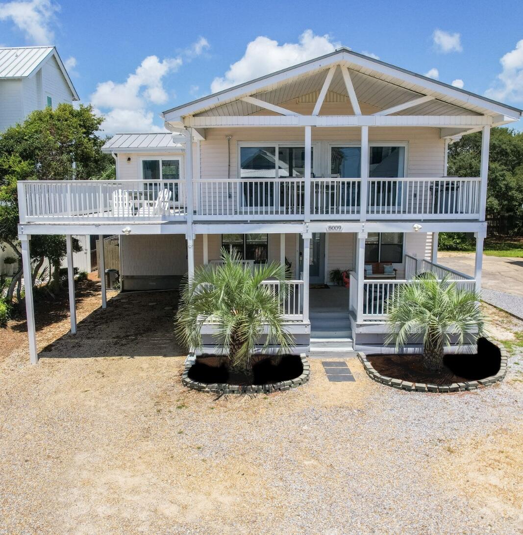 8009 East County Highway 30A Inlet Beach, FL 32461 - Photo 5 of 53 a front view of a house with porch