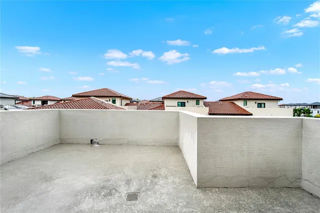 a view of building with river in front of it