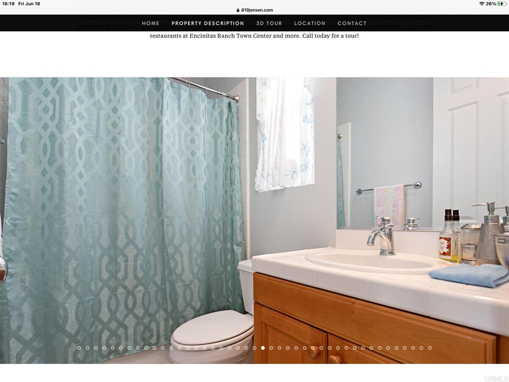 819 Jensen Court Encinitas, CA 92024 - Photo 49 of 50 a bathroom with a sink a toilet and a mirror