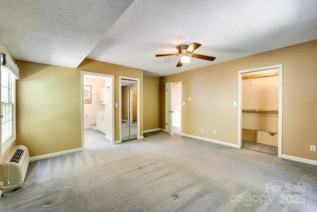 an empty room with a bathroom