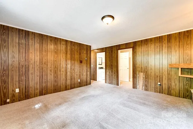 a view of a room with a balcony