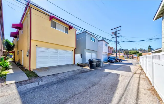 a view of a street with cars