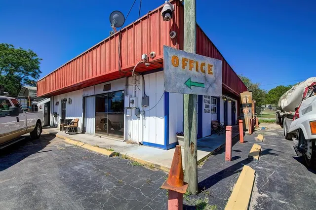a view of a building with sitting area
