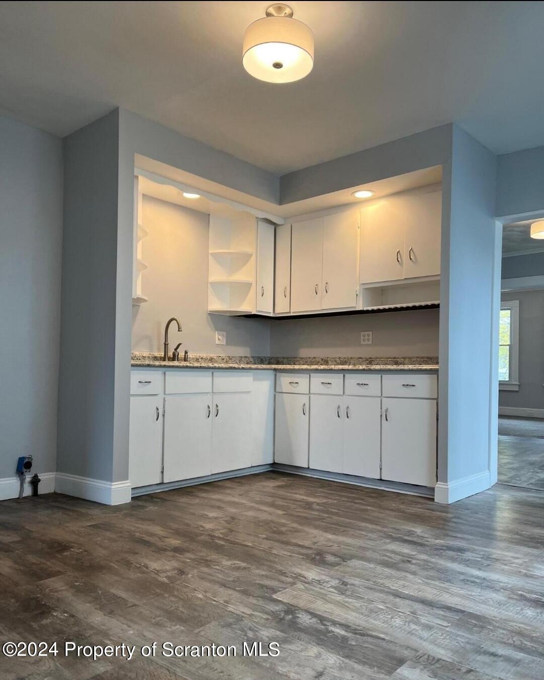922 South Webster Avenue, Unit 1 Scranton, PA 18505 - Photo 3 of 11 a view of cabinets with wooden floor
