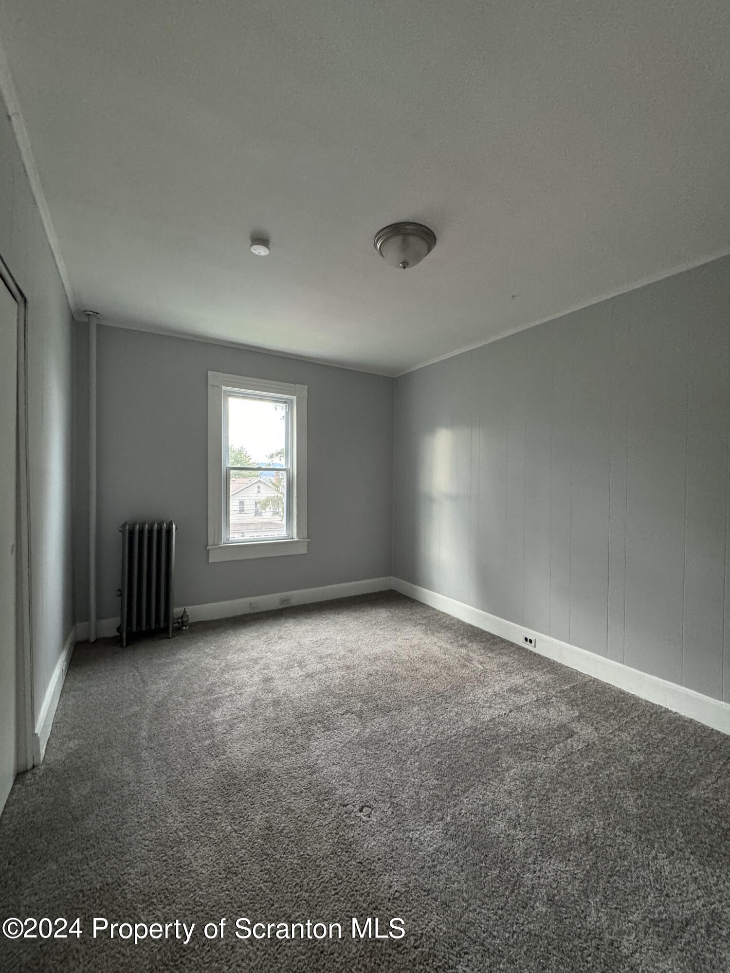 922 South Webster Avenue, Unit 1 Scranton, PA 18505 - Photo 7 of 11 an empty room with windows