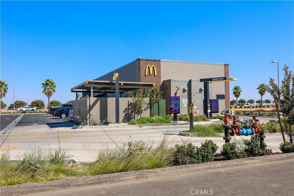 0 Mission Merced Ca Merced, CA 95341 - Photo 16 of 24 a front view of a house with a yard