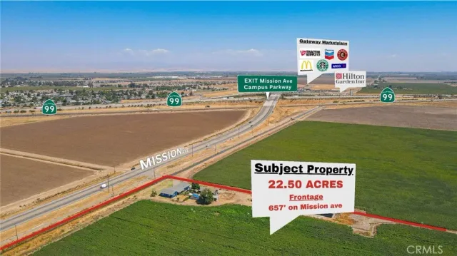 a view of a street with an ocean view