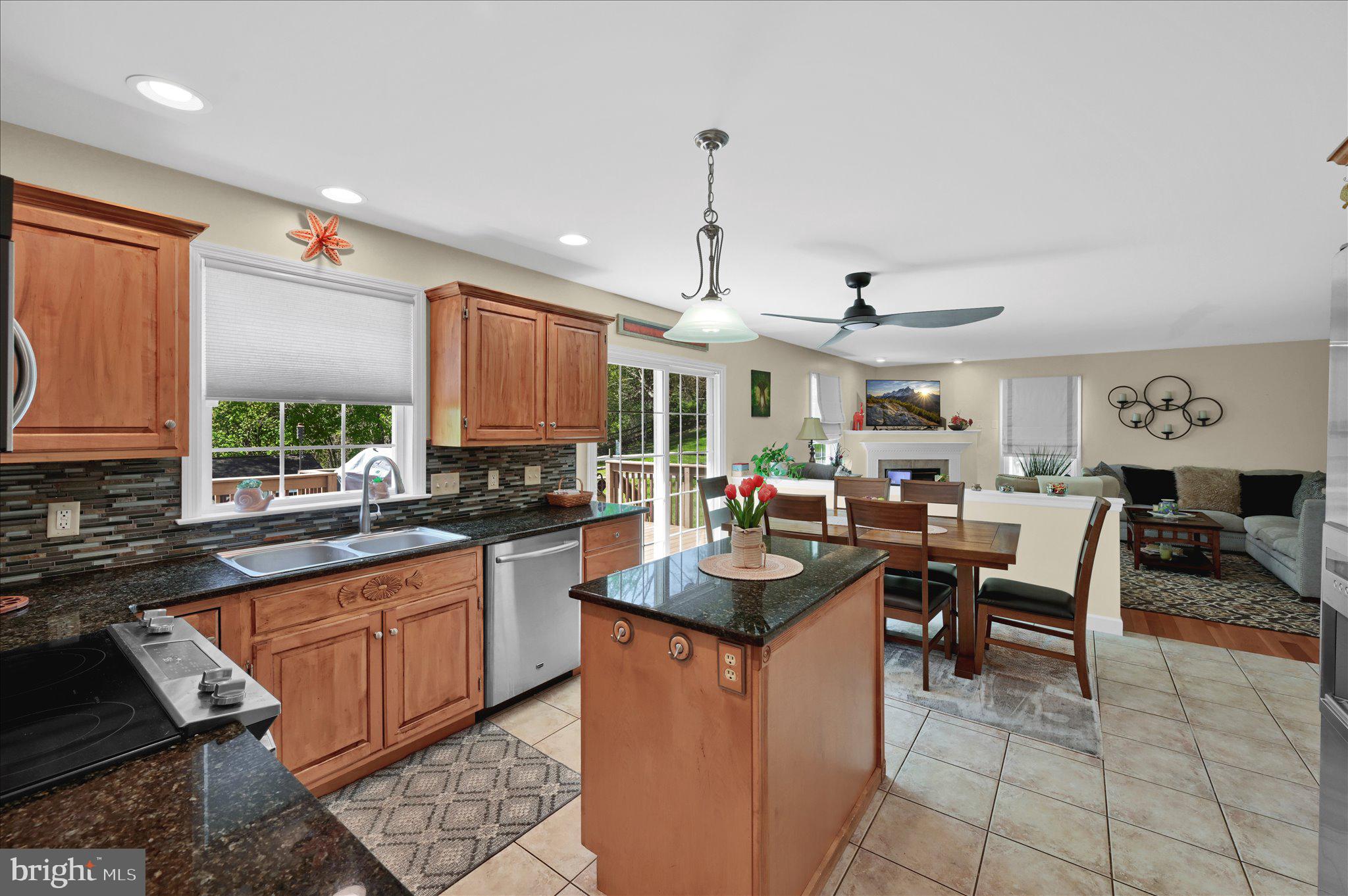 624 Stoney Run Road Pottsville, PA 17901 - Photo 12 of 40 a kitchen with sink a counter and chairs