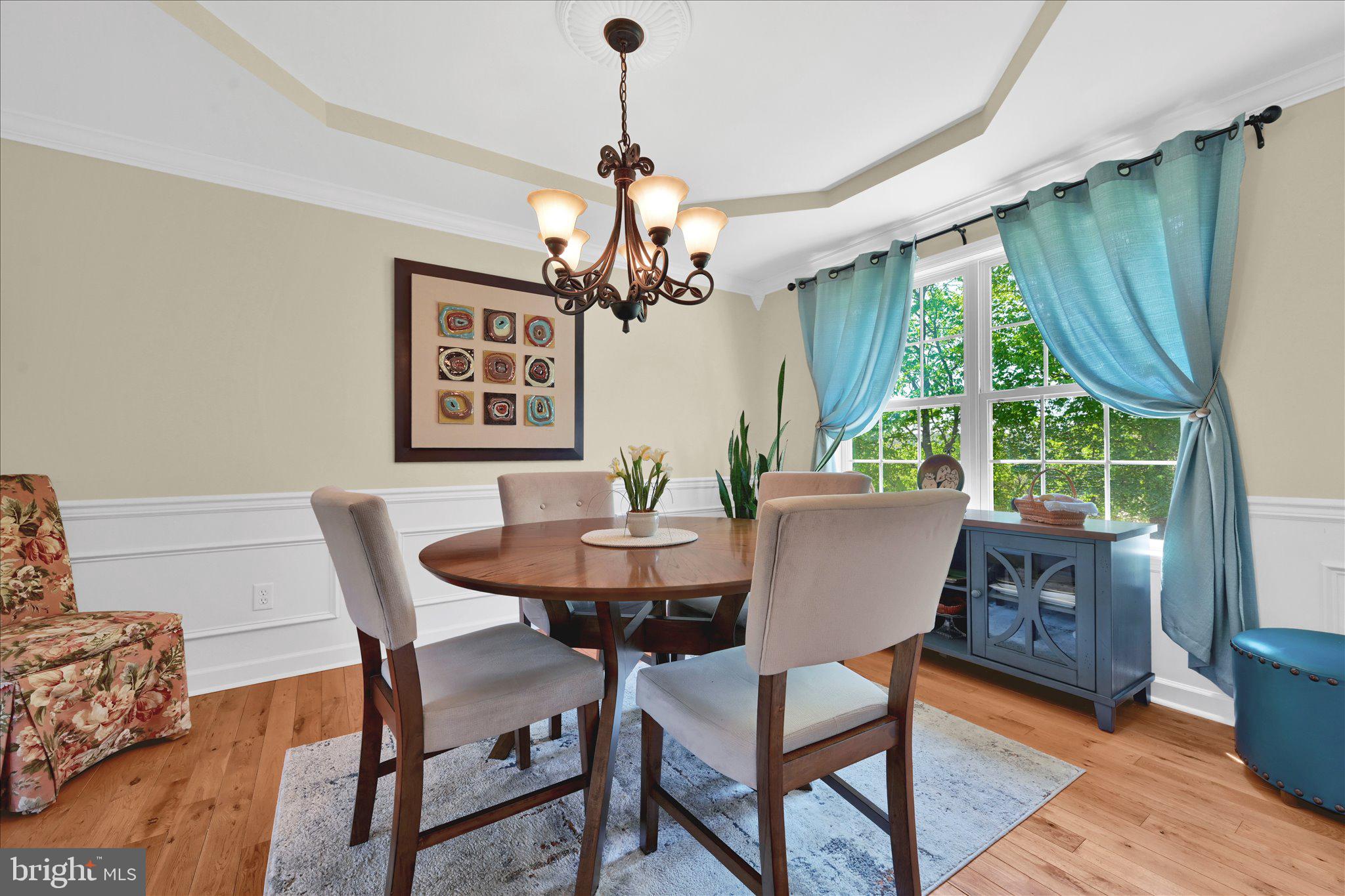 624 Stoney Run Road Pottsville, PA 17901 - Photo 13 of 40 a view of a dining room with furniture window and wooden floor