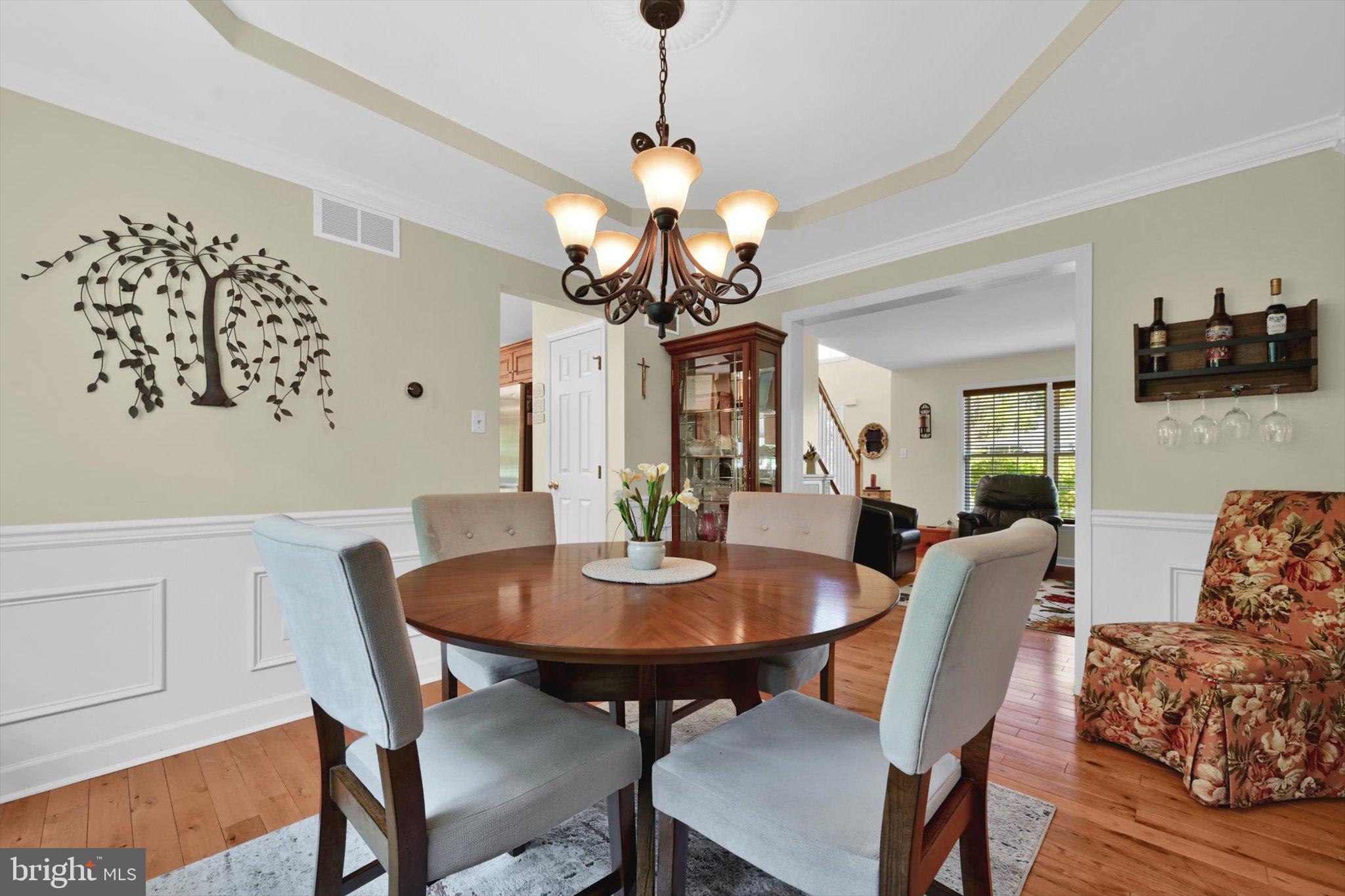 624 Stoney Run Road Pottsville, PA 17901 - Photo 14 of 40 a view of a dining room with furniture and wooden floor