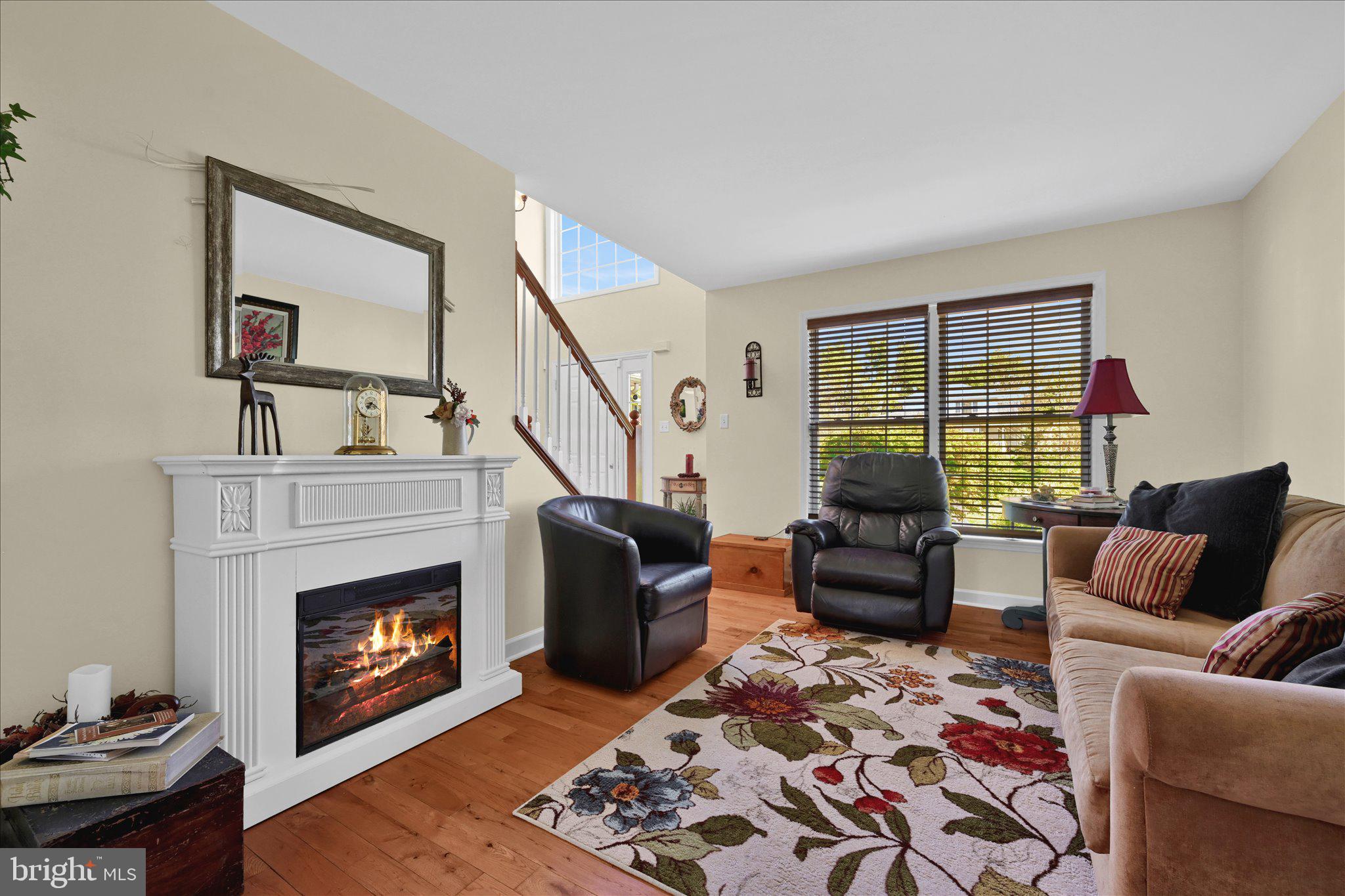 624 Stoney Run Road Pottsville, PA 17901 - Photo 15 of 40 a living room with furniture and a fireplace