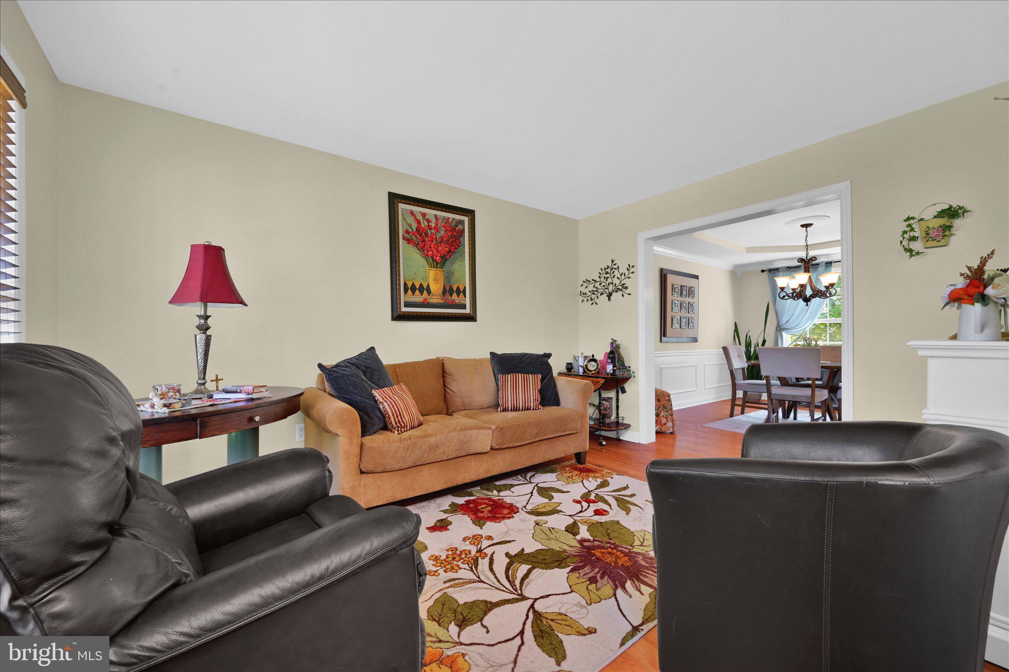624 Stoney Run Road Pottsville, PA 17901 - Photo 16 of 40 a living room with furniture a lamp and a window