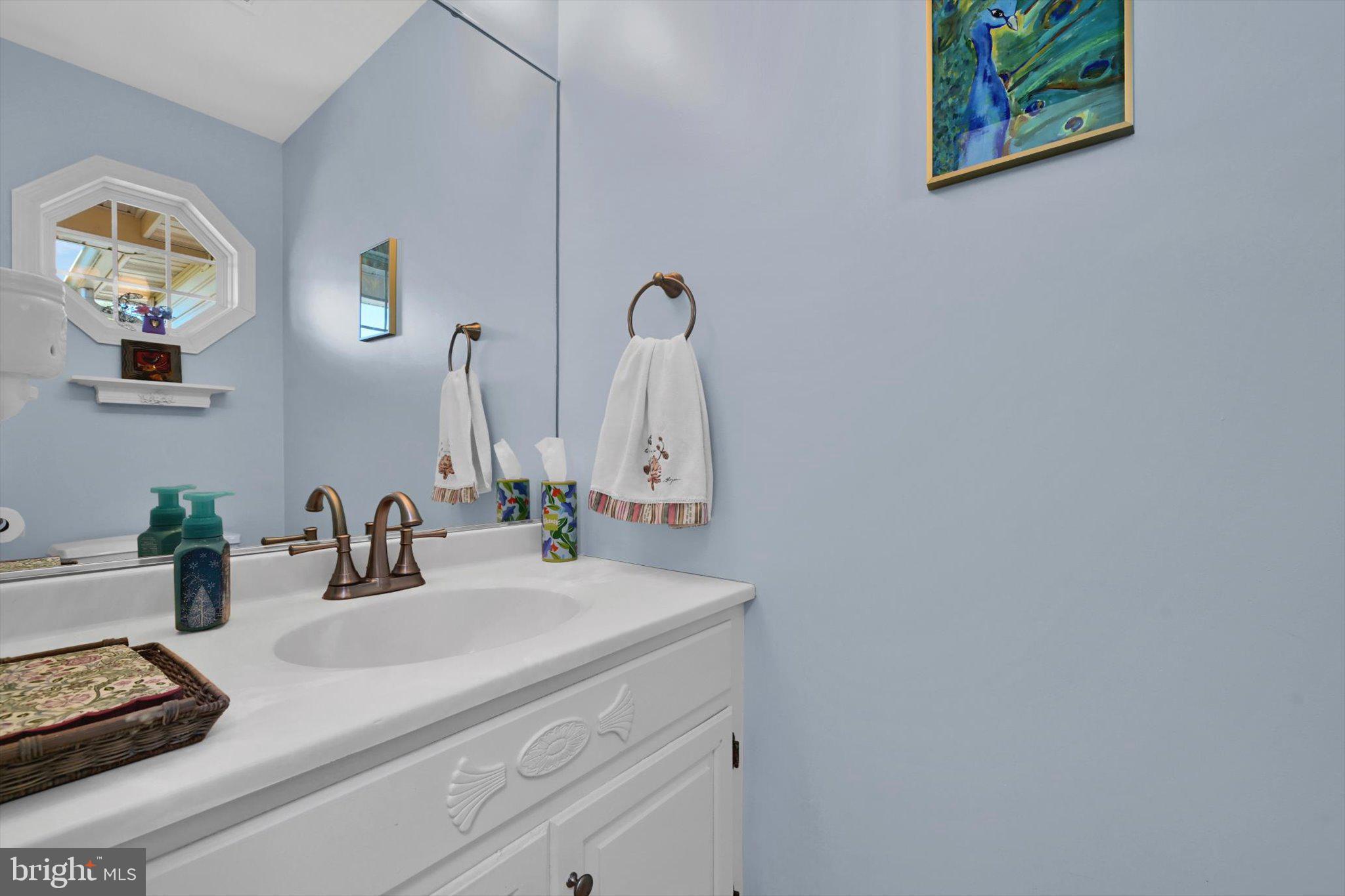 624 Stoney Run Road Pottsville, PA 17901 - Photo 17 of 40 a bathroom with a sink and a mirror