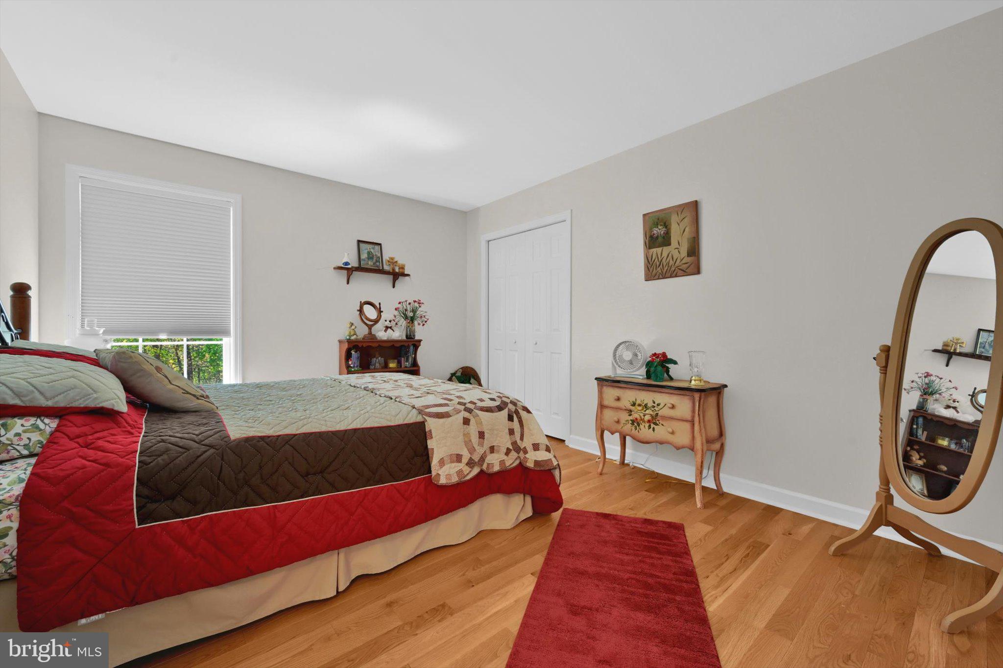624 Stoney Run Road Pottsville, PA 17901 - Photo 25 of 40 a bed room with a bed and a chair
