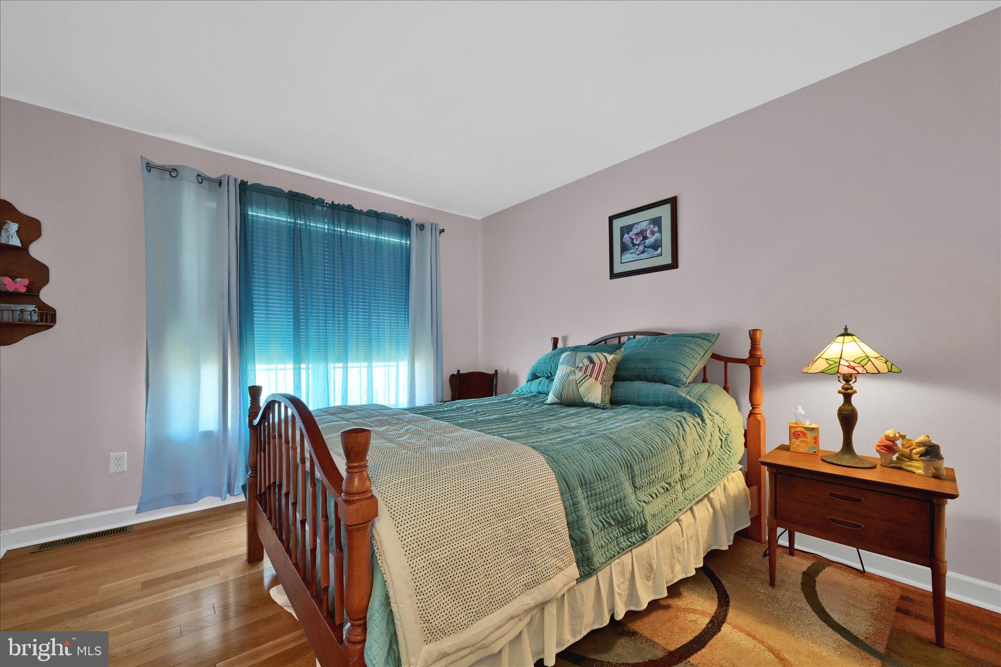 624 Stoney Run Road Pottsville, PA 17901 - Photo 29 of 40 a bedroom with a bed and a table in it
