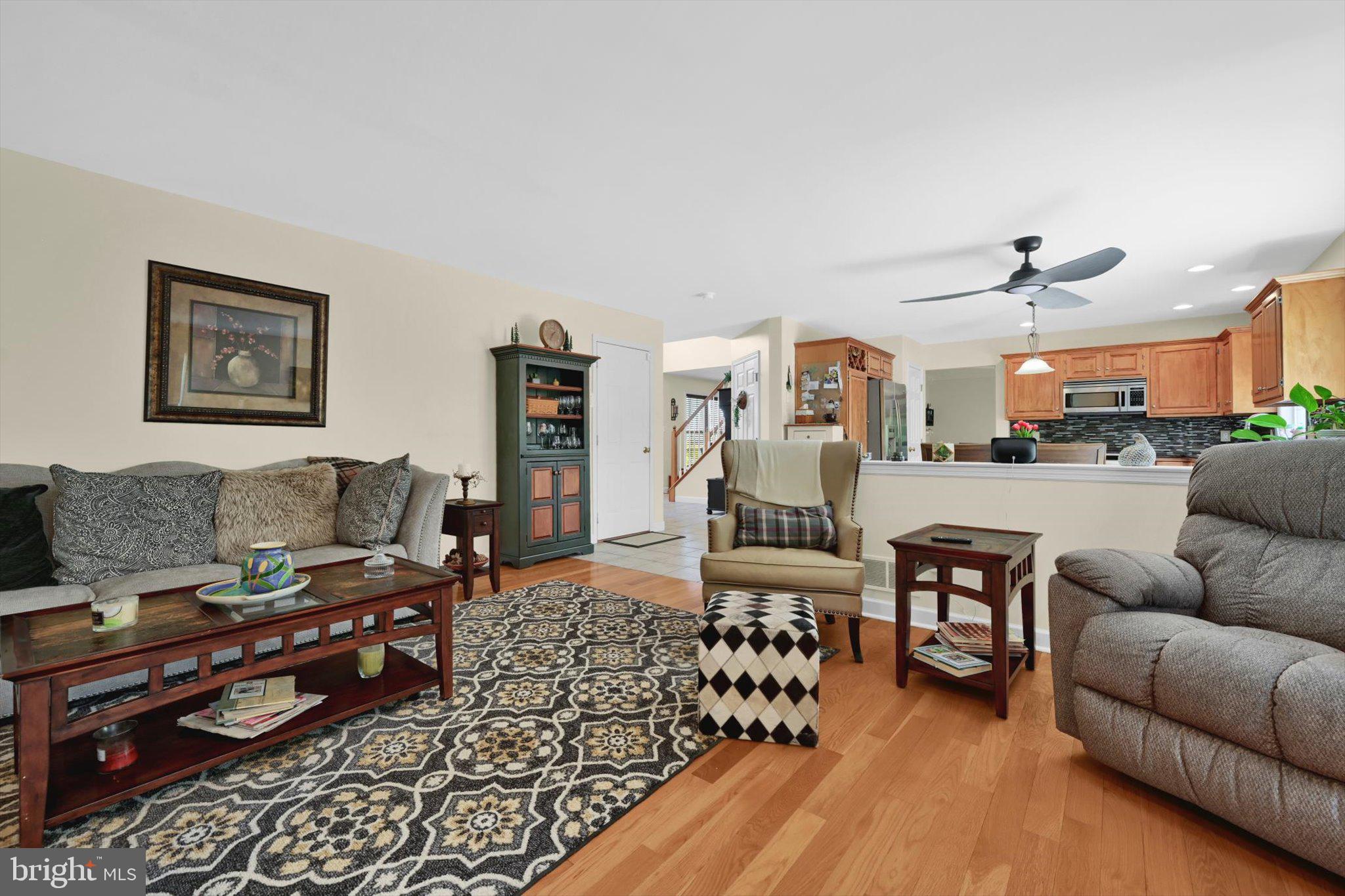 624 Stoney Run Road Pottsville, PA 17901 - Photo 7 of 40 a living room with furniture a rug and a chandelier