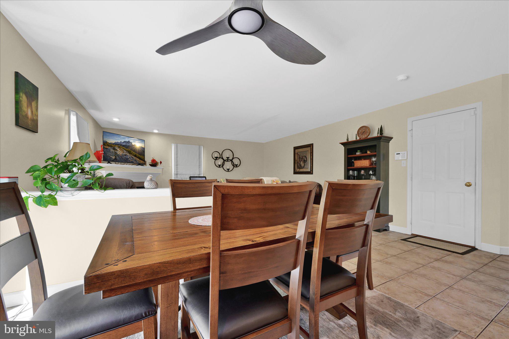 624 Stoney Run Road Pottsville, PA 17901 - Photo 9 of 40 a view of a dining room with furniture and wooden floor