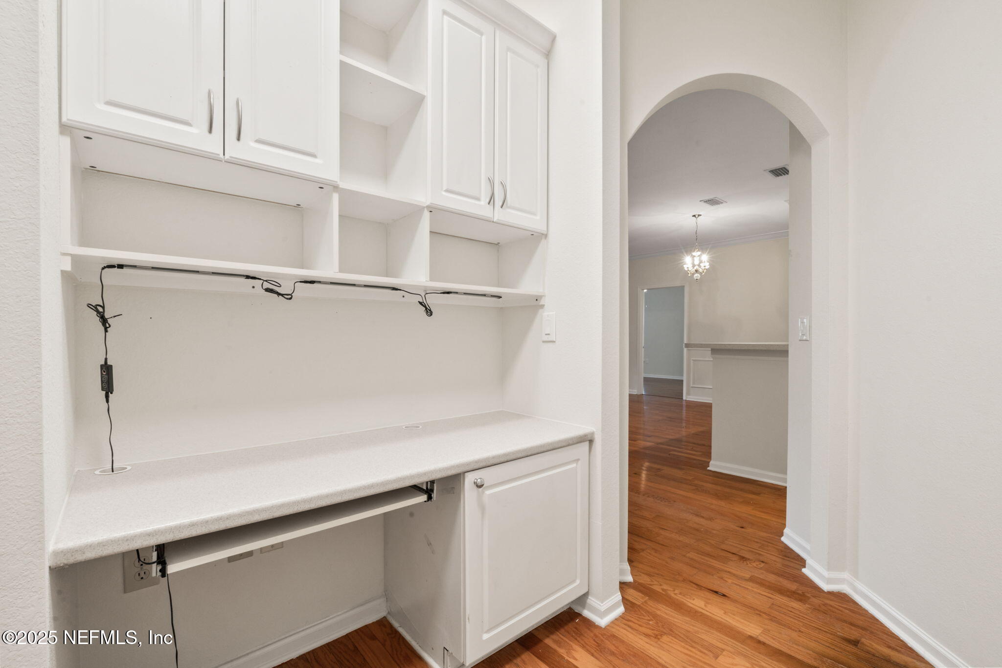 10901 Burnt Mill Road, Unit 2204 Jacksonville, FL 32256 - Photo 30 of 49 a view of a walk in closet and wooden floor