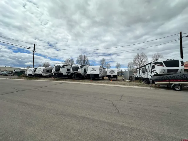 a view of street with parked cars