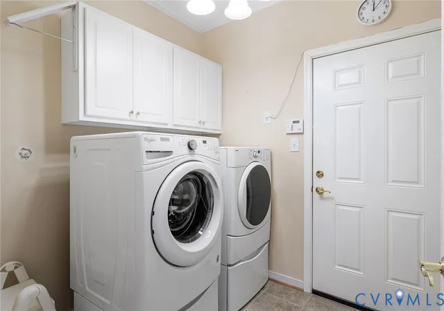 a spacious bedroom with a large bed and a large window