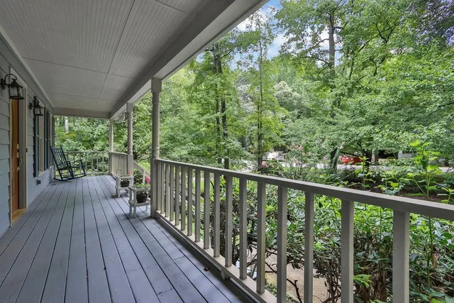 a view of balcony with wooden floor and outdoor space