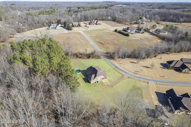 a view of a backyard of a house