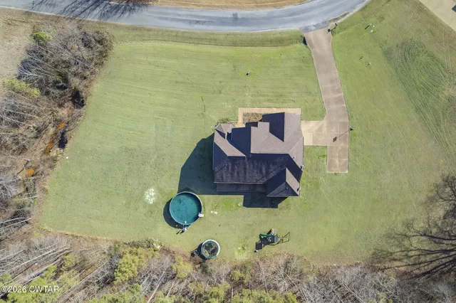 a front view of a house with yard