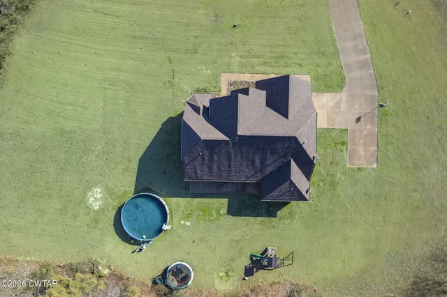 a view of backyard with outdoor space