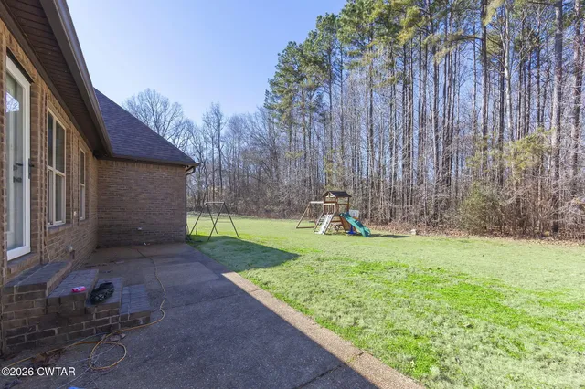 a house with garden in front of it
