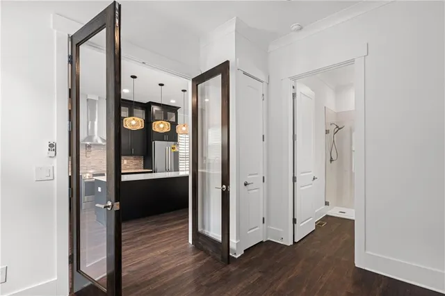a view of balcony with wooden floor and fence