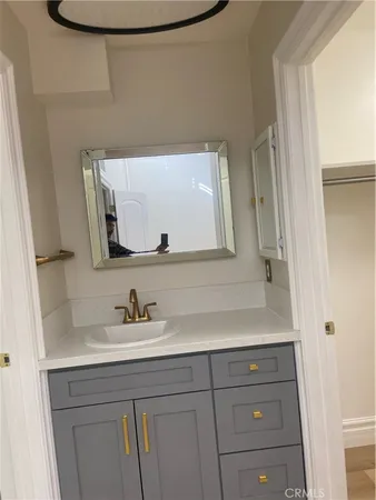 a white bath tub sitting in a bathroom