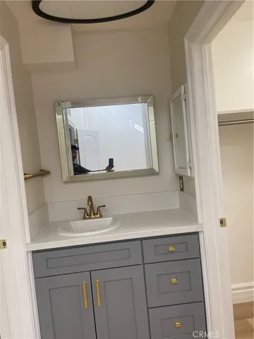 a white bath tub sitting in a bathroom