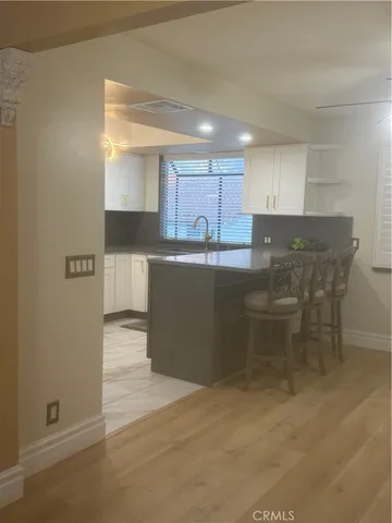 a view of potted plant in front of a door