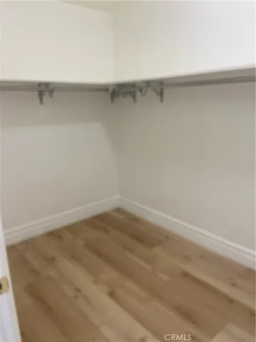 a close view of sink and cabinets