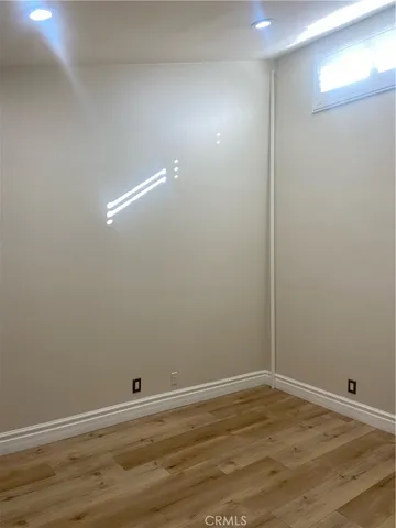 a kitchen with stainless steel appliances granite countertop a refrigerator sink and stove