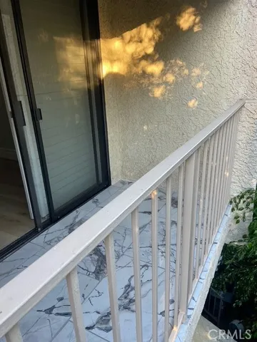 a close view of sink and cabinets