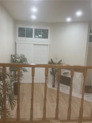 a view of cabinets and window