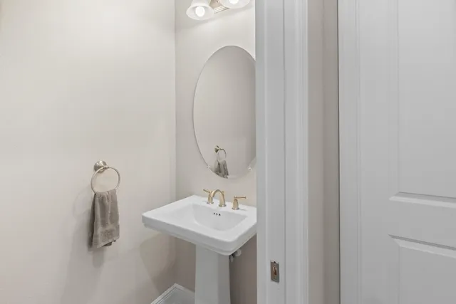 a front view of a building with a garden