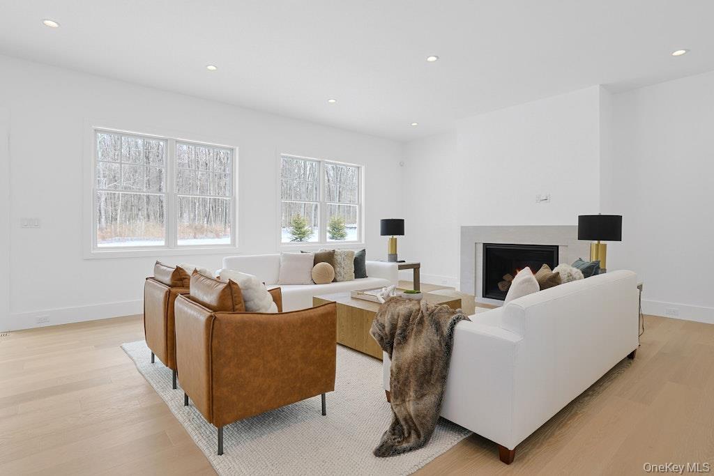 86 Old Byram Lake Road Armonk, NY 10504 - Photo 18 of 44 a living room with furniture and a fireplace