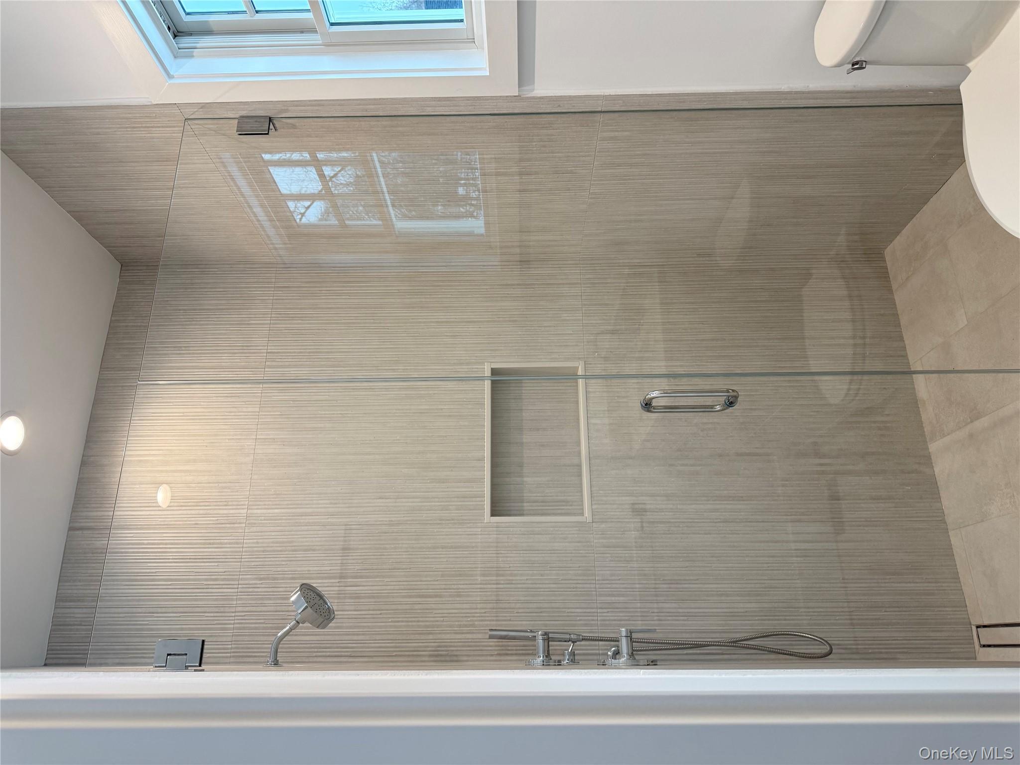 86 Old Byram Lake Road Armonk, NY 10504 - Photo 38 of 44 a bathroom with a shower and toilet